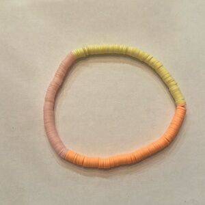 Smaller handmade necklace or bracelet.